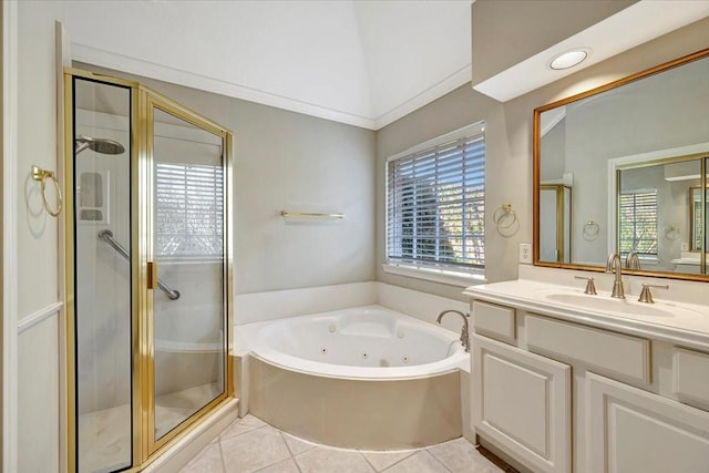 bathroom with a jetted tub, a shower stall, vanity, and tile patterned floors