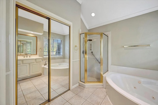 full bath with ornamental molding, vanity, a shower stall, a jetted tub, and tile patterned floors