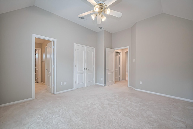 unfurnished bedroom with baseboards, visible vents, a closet, and light colored carpet