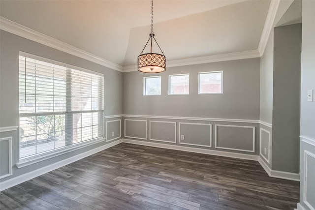 unfurnished room featuring dark wood-style floors, a wealth of natural light, ornamental molding, and a decorative wall