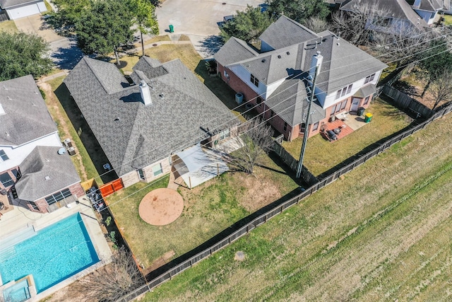 birds eye view of property with a residential view