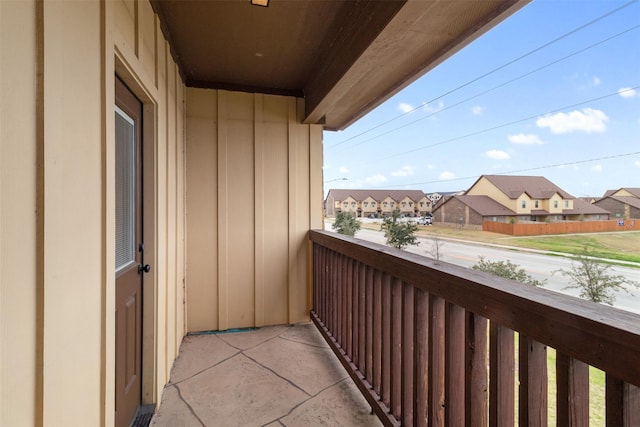 balcony featuring a residential view