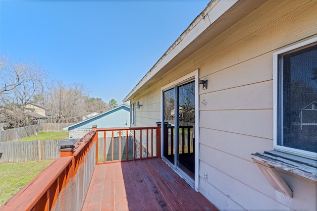 wooden deck featuring fence