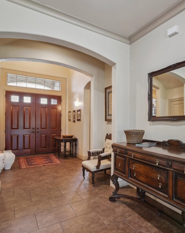 901 Longmire Rd Unit 17, Conroe, TX 77304 - foyer entrance with arched walkways and crown molding