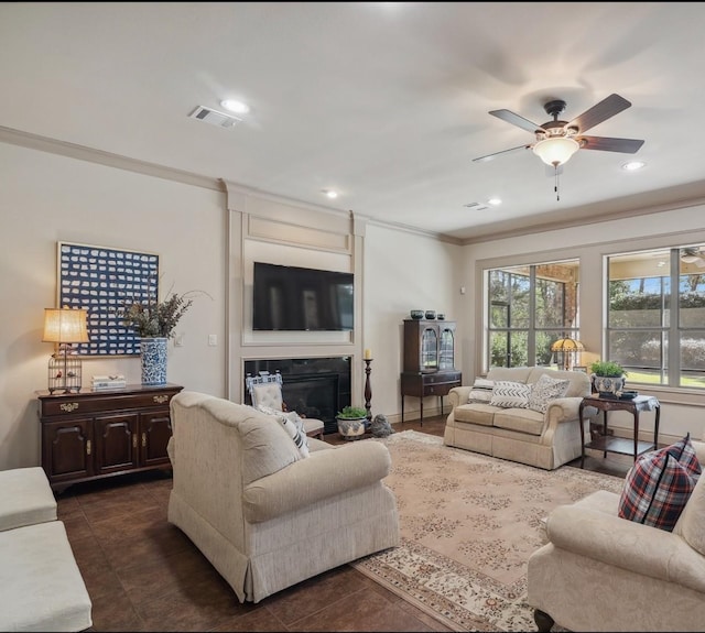 901 Longmire Rd Unit 17, Conroe, TX 77304 - living room with crown molding, ceiling fan, dark tile patterned floors, and recessed lighting