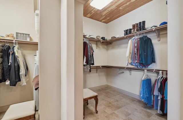 901 Longmire Rd Unit 17, Conroe, TX 77304 - spacious closet featuring stone finish flooring