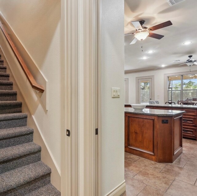 901 Longmire Rd Unit 17, Conroe, TX 77304 - staircase with a ceiling fan and recessed lighting