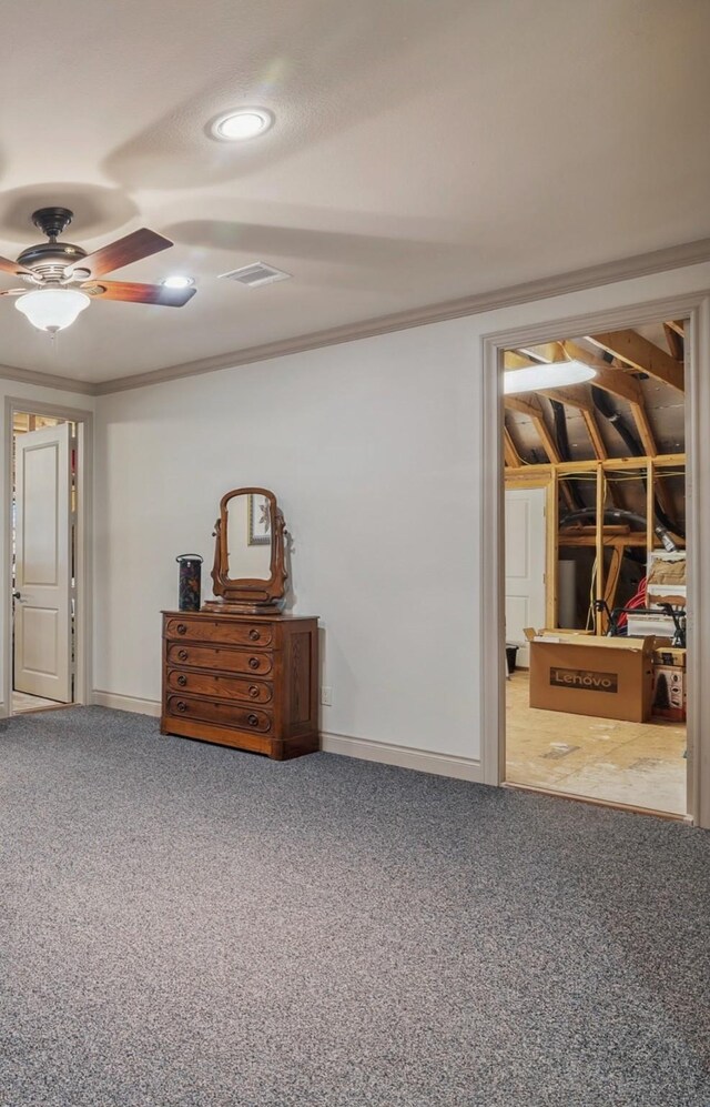 901 Longmire Rd Unit 17, Conroe, TX 77304 - basement with ornamental molding, carpet floors, recessed lighting, ceiling fan, and baseboards