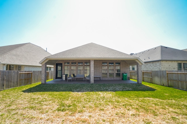 10711 Kingston Spring Dr, Missouri City, TX 77459 - back of house featuring a patio area and brick siding