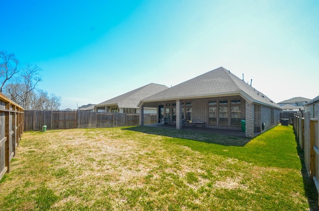 10711 Kingston Spring Dr, Missouri City, TX 77459 - back of house featuring brick siding and a patio area