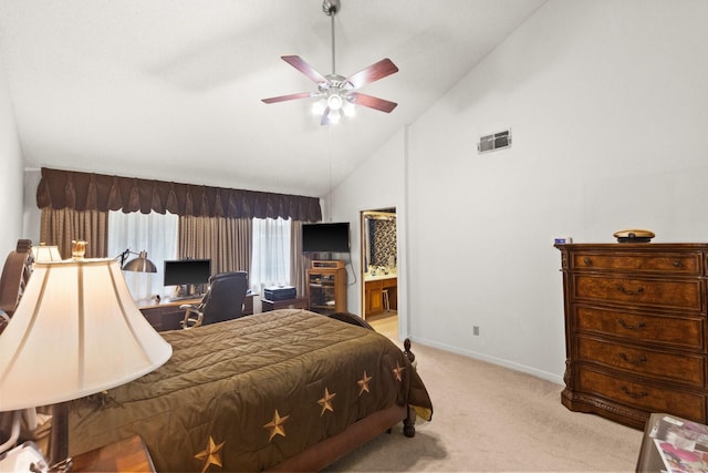 bedroom with visible vents, baseboards, light colored carpet, ensuite bathroom, and high vaulted ceiling