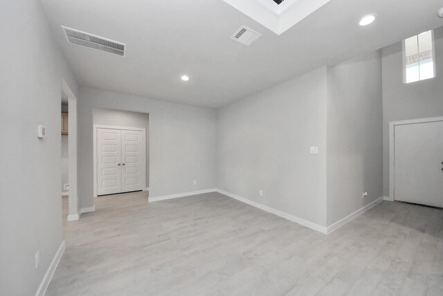 11926 Maple Oak Dr, Houston, TX 77066 - spare room with light wood-type flooring and recessed lighting
