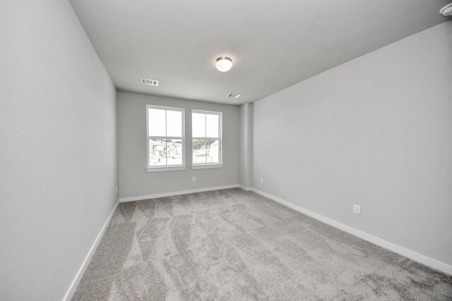 11926 Maple Oak Dr, Houston, TX 77066 - spare room with carpet floors and a smoke detector