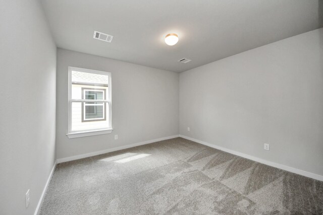 11926 Maple Oak Dr, Houston, TX 77066 - carpeted empty room with baseboards