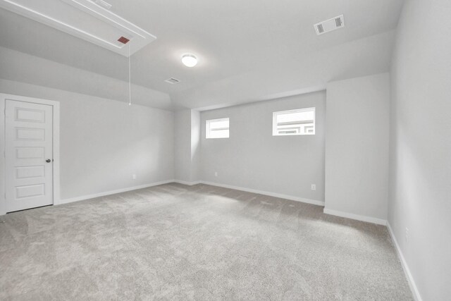 11926 Maple Oak Dr, Houston, TX 77066 - carpeted spare room with attic access and baseboards
