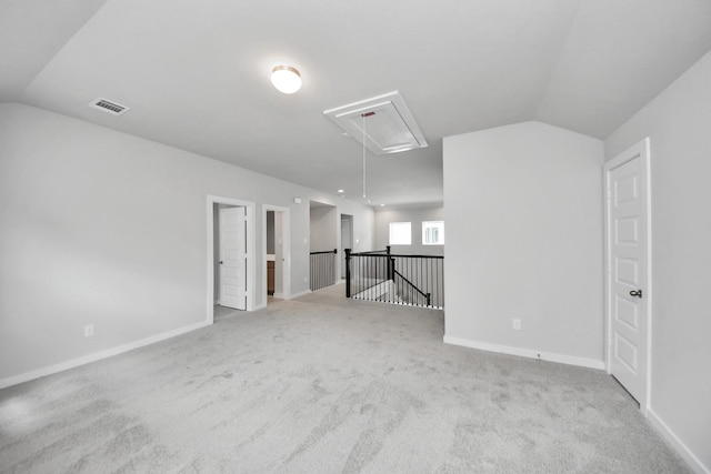 11926 Maple Oak Dr, Houston, TX 77066 - carpeted empty room with attic access and lofted ceiling