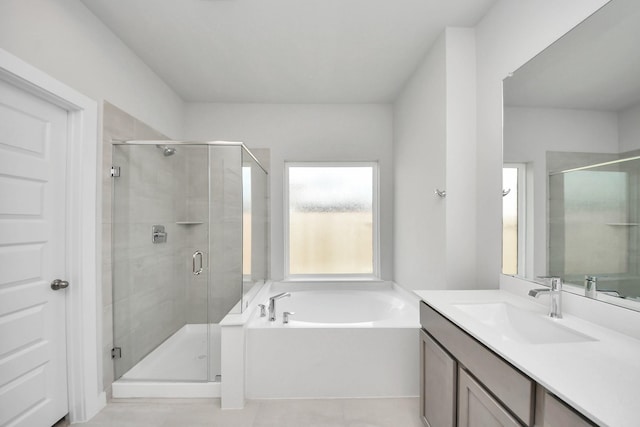 11926 Maple Oak Dr, Houston, TX 77066 - full bathroom with a garden tub, vanity, and a stall shower