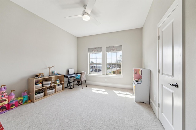 game room featuring carpet floors and a ceiling fan