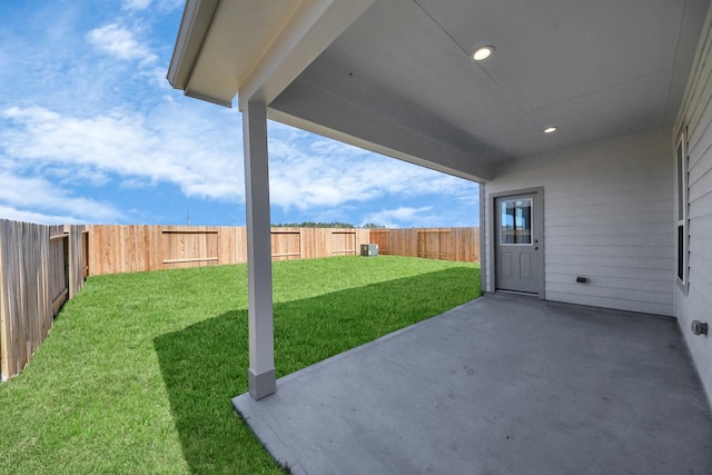 view of yard with a patio and a fenced backyard