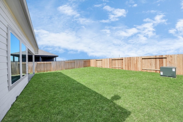 view of yard featuring a fenced backyard