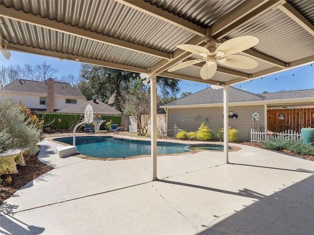 view of pool with a fenced in pool, a patio area, a fenced backyard, and a ceiling fan