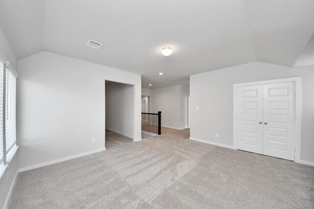 14811 Surfbird Ln, Houston, TX 77049 - interior space featuring visible vents, baseboards, and vaulted ceiling