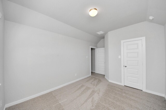 14811 Surfbird Ln, Houston, TX 77049 - unfurnished bedroom featuring lofted ceiling, visible vents, baseboards, and carpet floors