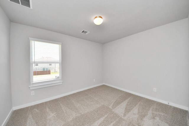 14811 Surfbird Ln, Houston, TX 77049 - carpeted spare room with visible vents and baseboards
