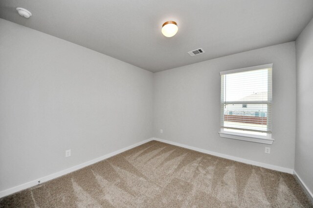 14811 Surfbird Ln, Houston, TX 77049 - carpeted empty room featuring baseboards and visible vents
