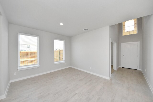 14811 Surfbird Ln, Houston, TX 77049 - spare room featuring visible vents, recessed lighting, baseboards, and light wood-style floors
