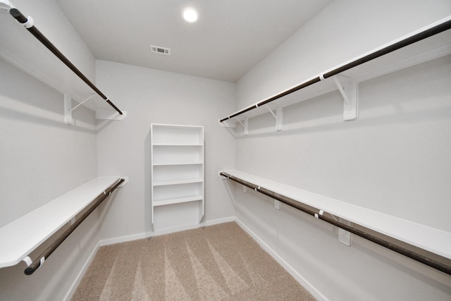14811 Surfbird Ln, Houston, TX 77049 - spacious closet featuring light colored carpet and visible vents