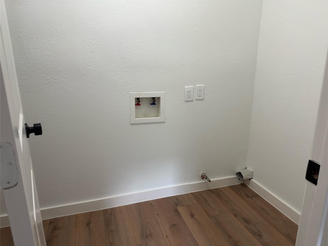 laundry room with laundry area, hookup for a washing machine, baseboards, and dark wood-type flooring