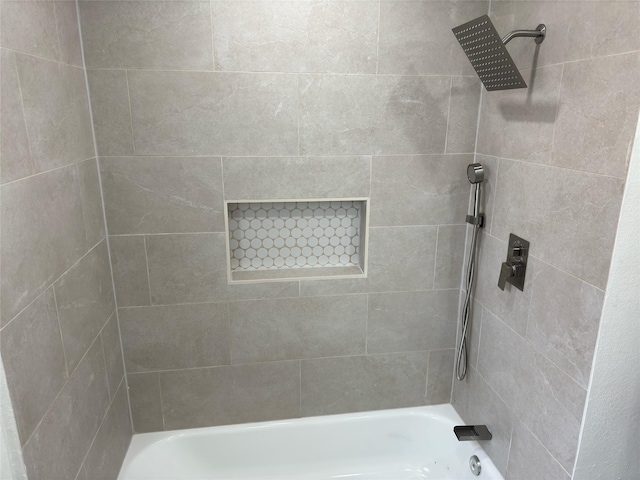 full bath featuring shower / washtub combination