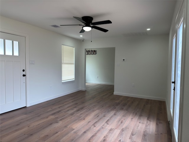 entrance foyer featuring a ceiling fan, recessed lighting, baseboards, and wood finished floors