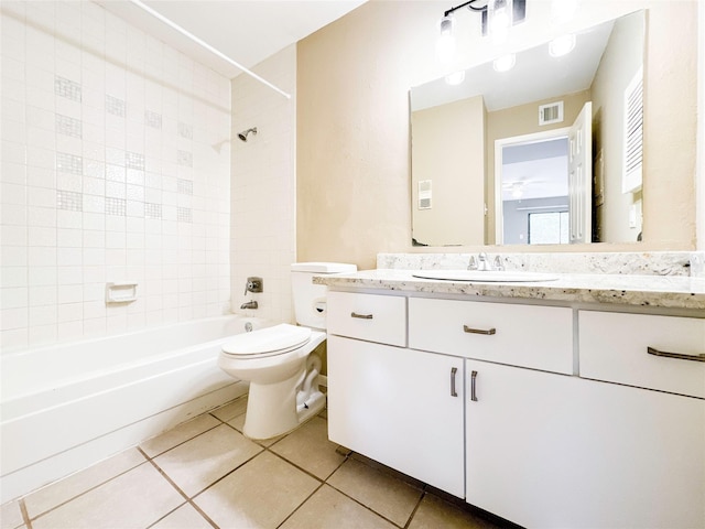 full bathroom with shower / bathtub combination, toilet, visible vents, and tile patterned floors