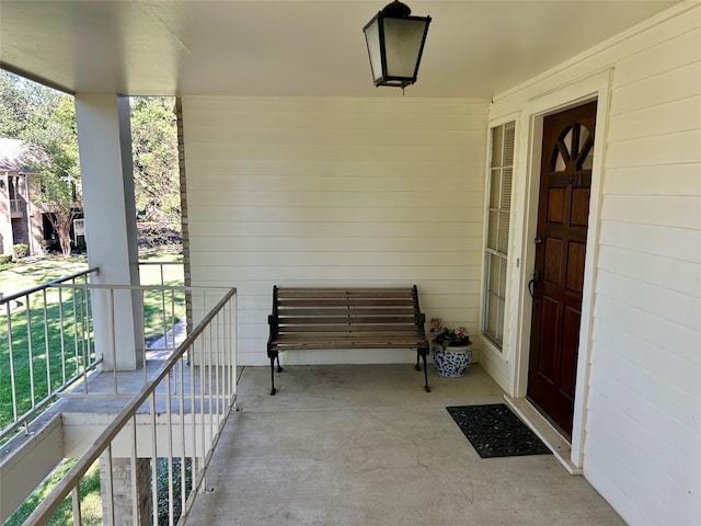 entrance to property featuring a balcony