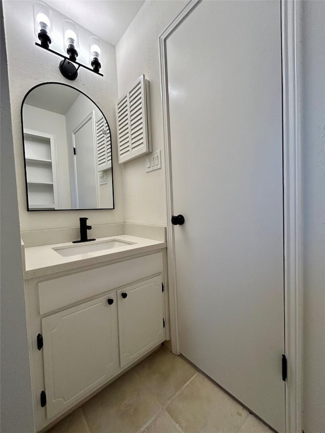 bathroom featuring vanity and tile patterned floors