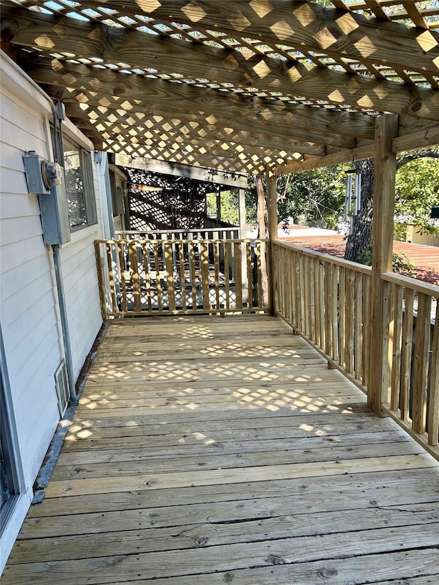 wooden terrace featuring a pergola