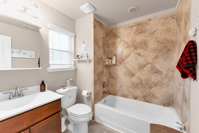 full bath with visible vents, toilet, tub / shower combination, and vanity