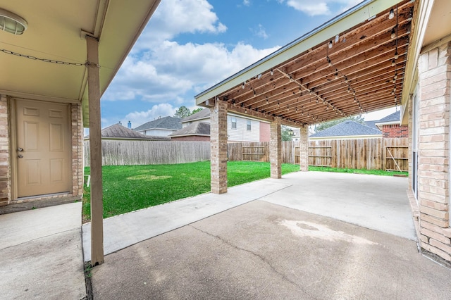 view of patio featuring fence