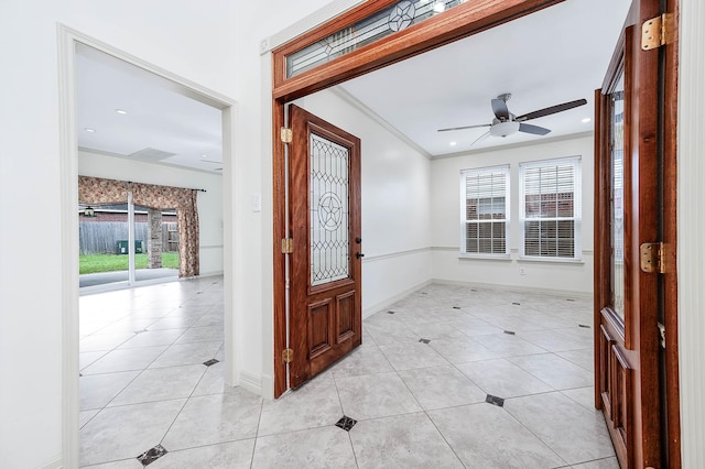 foyer entrance featuring ceiling fan, light tile patterned floors, recessed lighting, baseboards, and ornamental molding