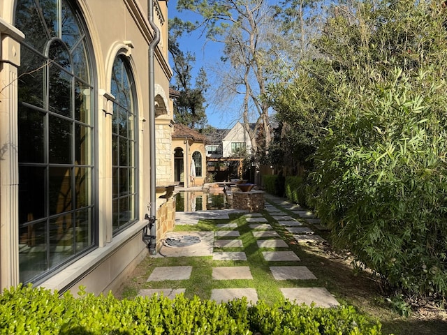 11117 Beinhorn Rd, Houston, TX 77024 - view of yard with a patio area