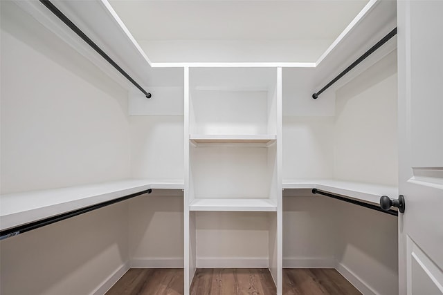 spacious closet with wood finished floors