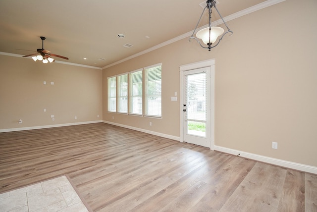 interior space featuring light wood finished floors, baseboards, ornamental molding, and recessed lighting