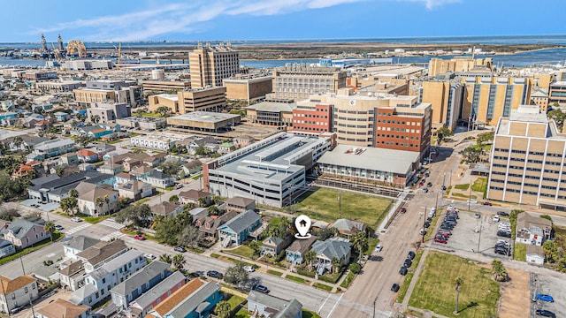 aerial view featuring a water view and a city view