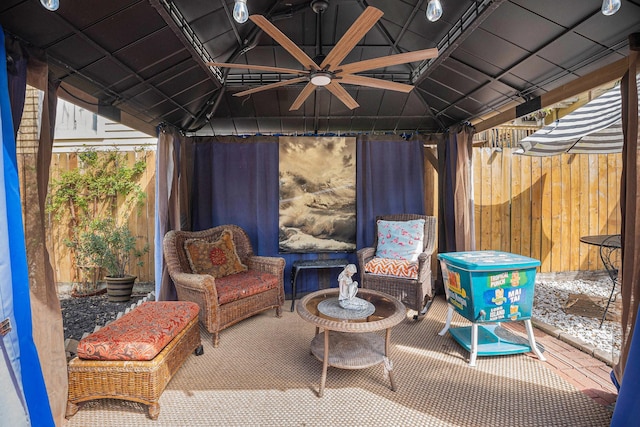 view of patio with fence and a gazebo