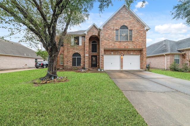 traditional-style home with an attached garage, a front yard, concrete driveway, and brick siding