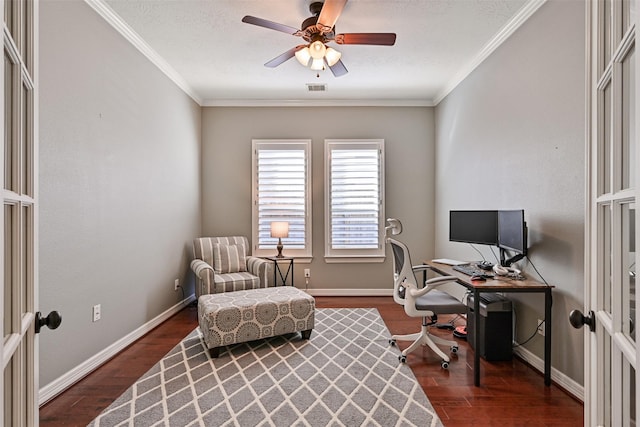 office featuring visible vents, wood finished floors, and ornamental molding