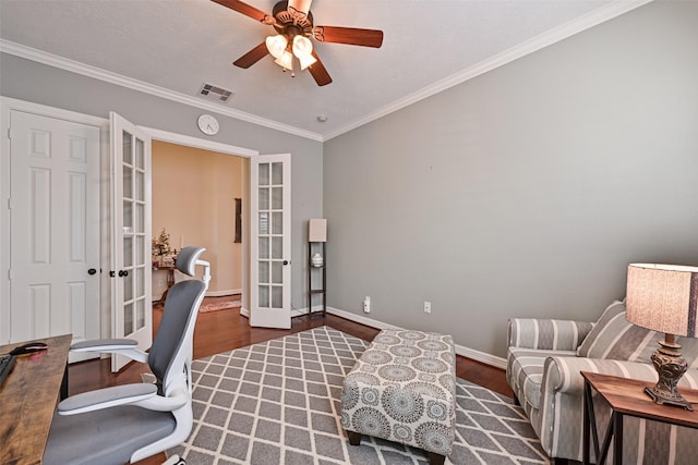 office area with wood finished floors, visible vents, baseboards, ornamental molding, and french doors