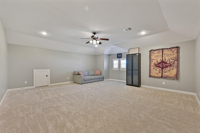 unfurnished room with light colored carpet, visible vents, and baseboards